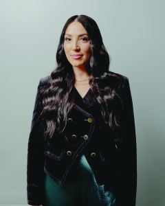 A woman in business attire.