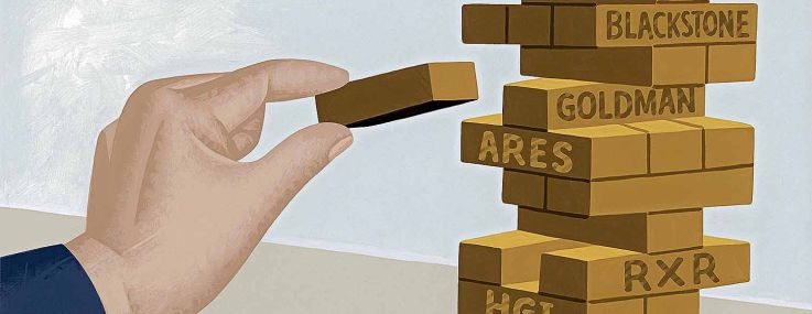 A photo of a man holding a jenga block.
