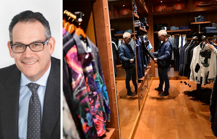 David Simon, CEO of Simon Property Group, and a shopper browses inside one of Simon Property Group's malls.