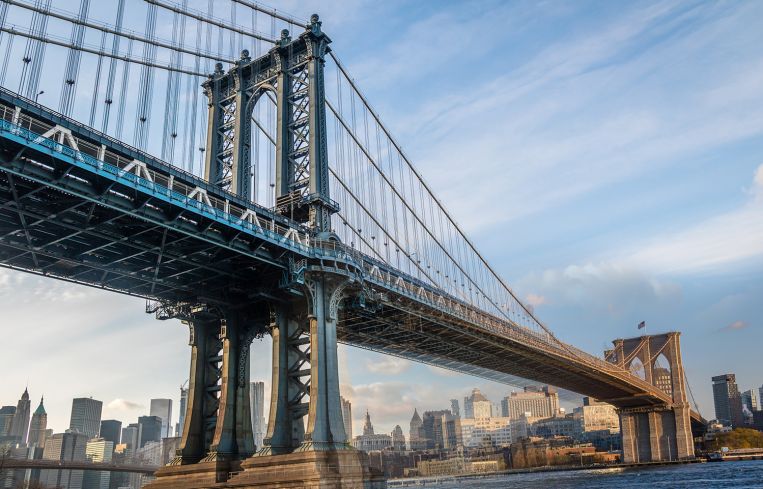 The Manhattan Bridge merging with the Brooklyn Bridge.