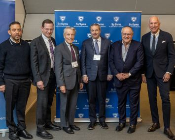 The 2nd annual Yeshiva University Real Estate Day at Syms School of Business featured from left, David Lichtenstein, founder and CEO, The Lightstone Group; Dr. Noam Wasserman, dean of the Sy Syms School of Business; Michael Strauss, associate dean of Sy Syms School of Business; YU President Ari Berman; Phil Rosen, retired Partner, Weil, Gotshal, & Manges; and Steve Rosenberg, founder, executive chairman and CEO of Greystone.