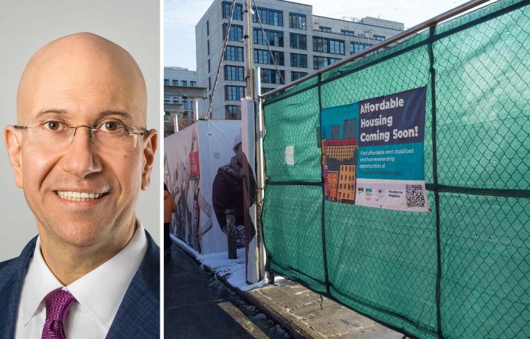 Shimon Shkury, president and founder of Ariel Property, and a sign promoting an affordable housing project.
