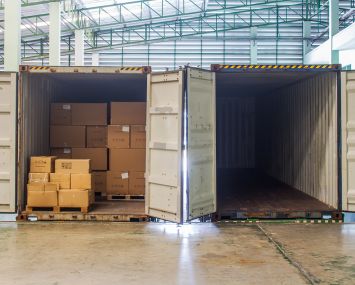 Shipping containers in a warehouse.