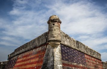 A fort with an American flag painted on it.