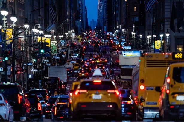 Traffic moves along midtown Manhattan.