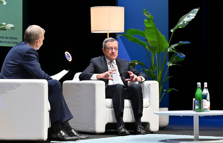 Former Italian Prime Minister Mario Draghi speaks during the keynote Tuesday at the annual MIPIM global real estate convention in Cannes, France.