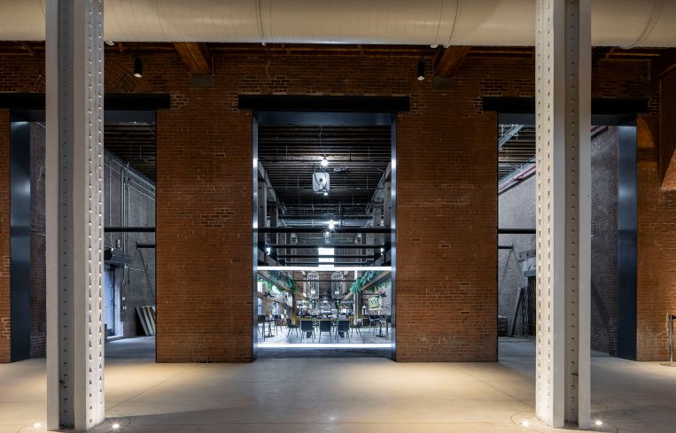 Renderings in some of the corridor openings showcase how the property will be transformed into cafe, event and coworking spaces.