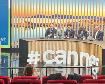 David Forti, David Bouton, Kwasi Benneh, and Michael Lascher speak at the Trends in U.S. Real Estate and Capital Markets panel at MIPIM on March 12.