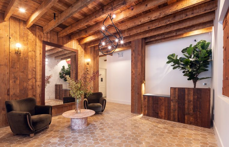 The lobby of 524 Halsey Street in Brooklyn is warm and inviting.