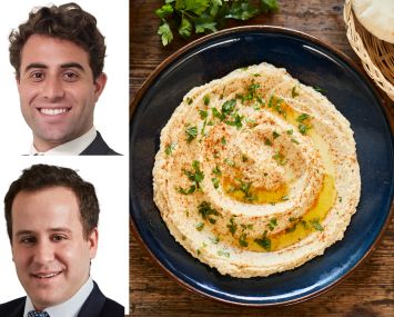 Newmark's Gabriel Staab and Ross Berkowitz, and plates of Mediterranean food.