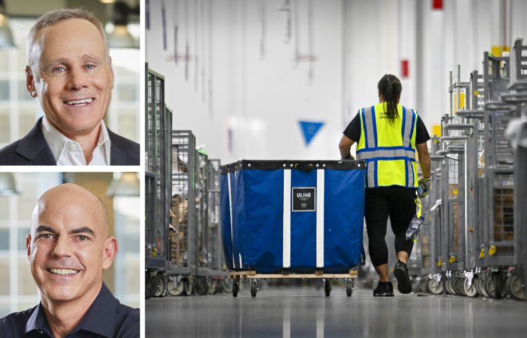 Howard Schwimmer and Michael Frankel, co-CEOs of Rexford, and a worker walking through the aisles of a warehouse.