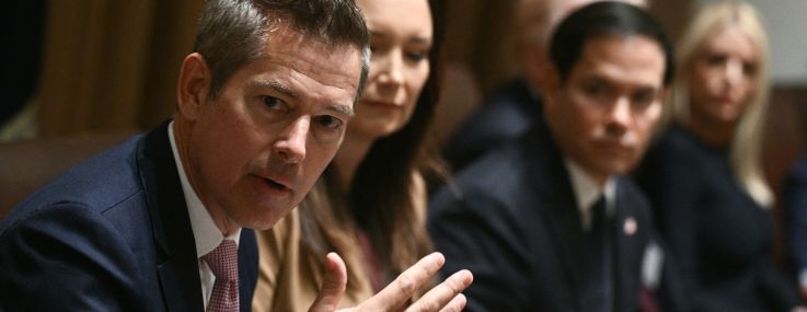 Secretary of Transportation Sean Duffy (L) speaks at a cabinet meeting.
