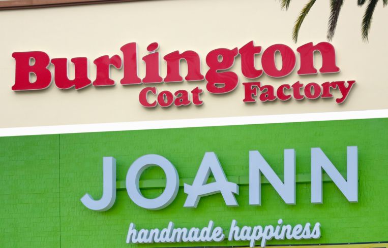 Signs for Burlington and Joann stores.