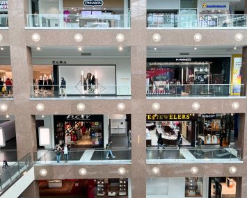 Shoppers walk through the Fashion Centre at Pentagon City, a shopping mall in Arlington, Virginia.