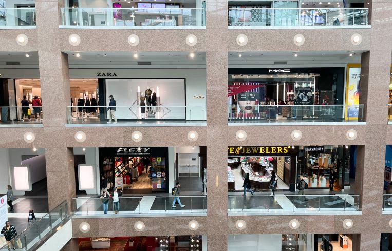 Shoppers walk through the Fashion Centre at Pentagon City, a shopping mall in Arlington, Virginia.