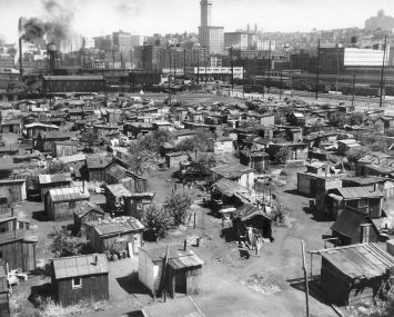 A aerial shot of a bunch of shoddy tents.