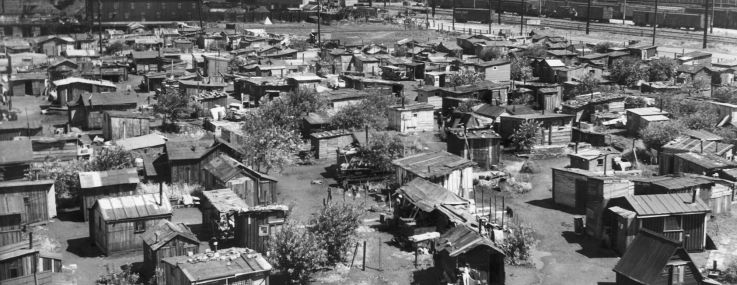 A aerial shot of a bunch of shoddy tents.