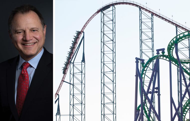 Six Flags CEO Richard Zimmerman and the Super Man: Ride of Steel roller coaster at Six Flags America, Bowie, Md.