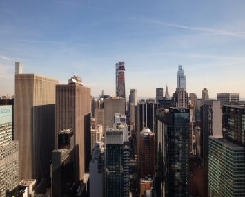Aerial view of Midtown Manhattan's forest of skyscrapers.