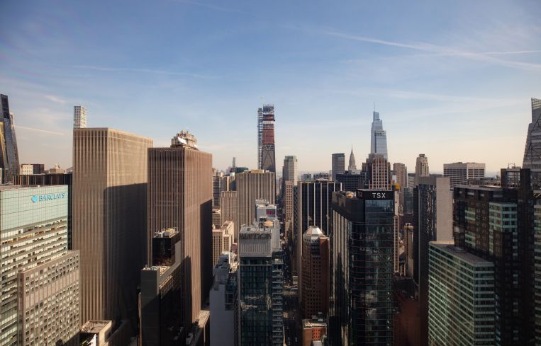 Aerial view of Midtown Manhattan's forest of skyscrapers.