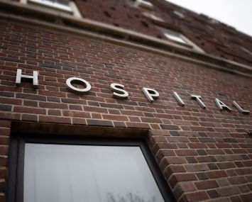 The brick building facade of an American hospital