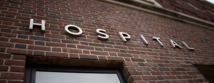 The brick building facade of an American hospital