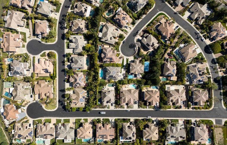 an aerial view of single family homes.