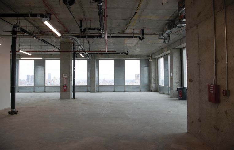 A bare office floor at 1520 First Avenue.