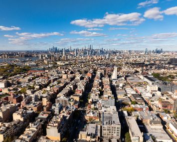 An aerial view of Brooklyn looking toward Manhattan.