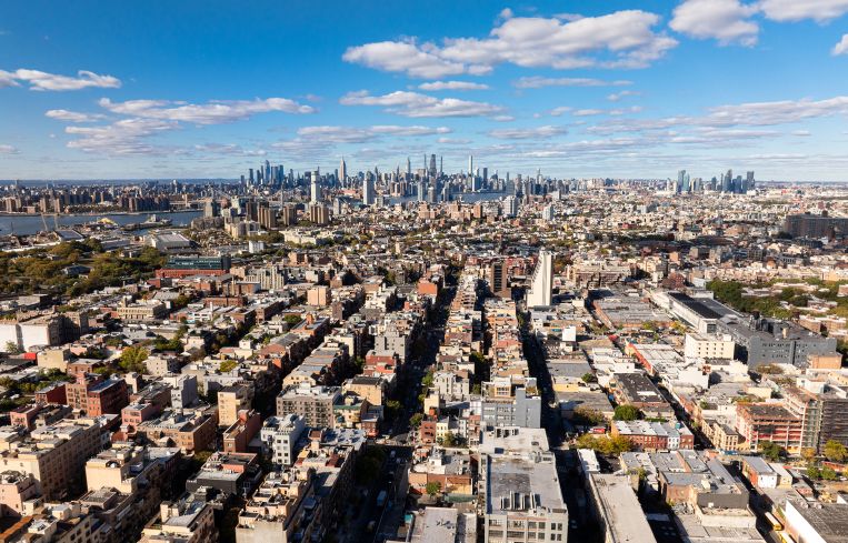 An aerial view of Brooklyn looking toward Manhattan.