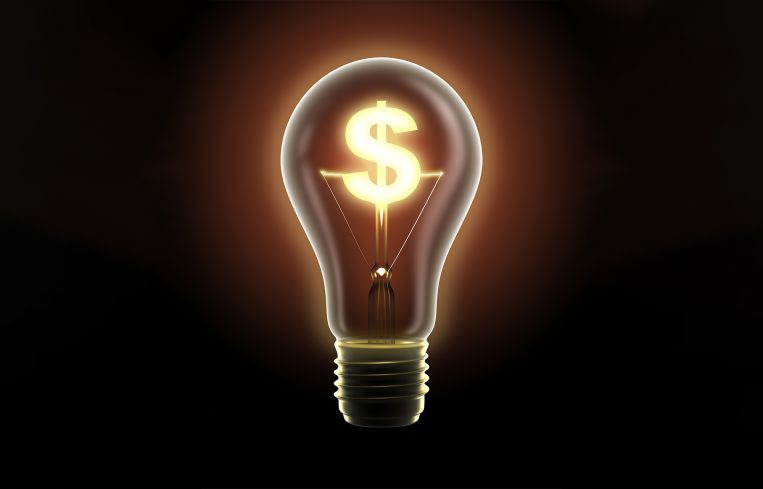 A light bulb with a dollar sign filament inside.