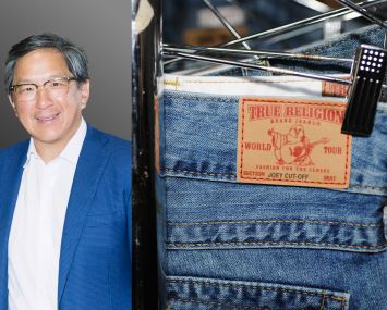 Jackson Hsieh, president and CEO of Macerich, and a rack of True Religion jeans.