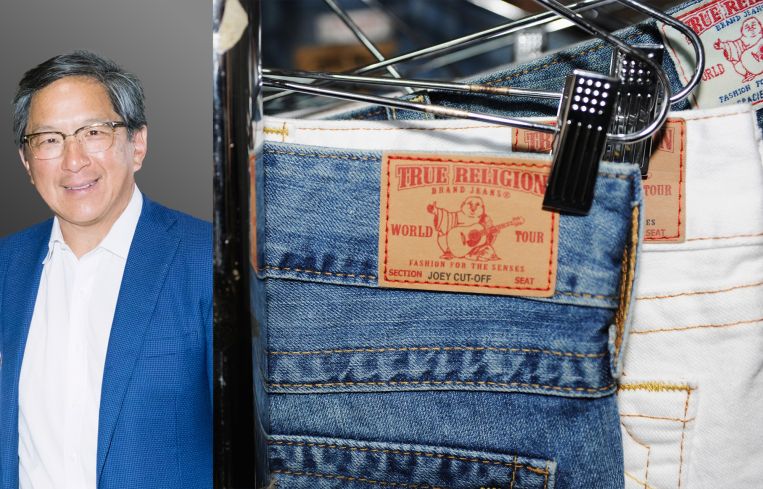 Jackson Hsieh, president and CEO of Macerich, and a rack of True Religion jeans.