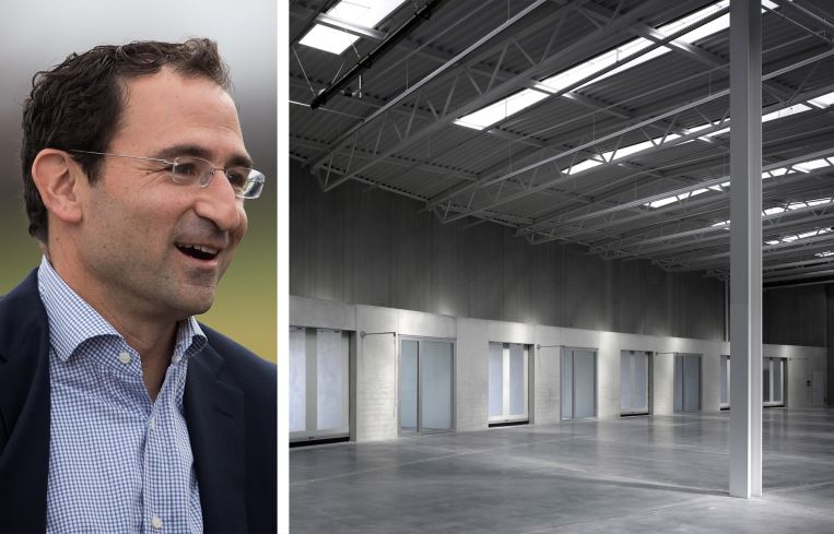 Jonathan Gray, president and COO of Blackstone, and an empty warehouse interior.