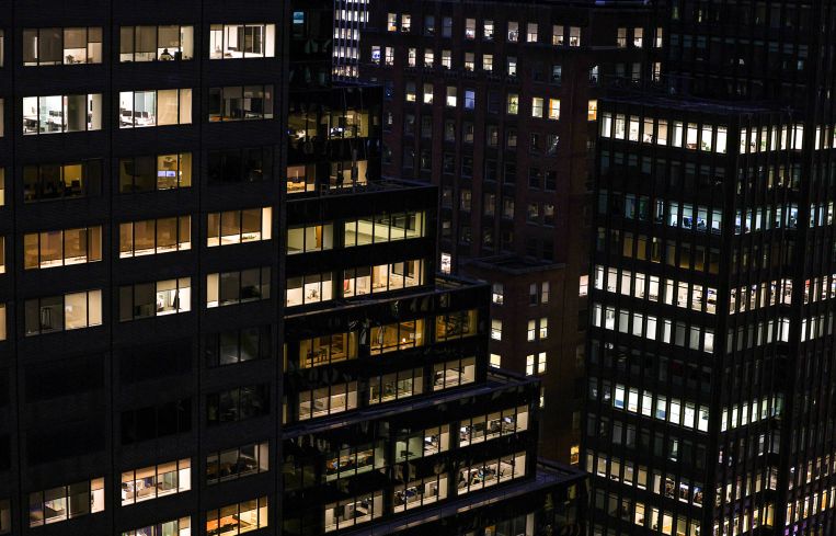 Office and residential buildings remain lit at night New York City.