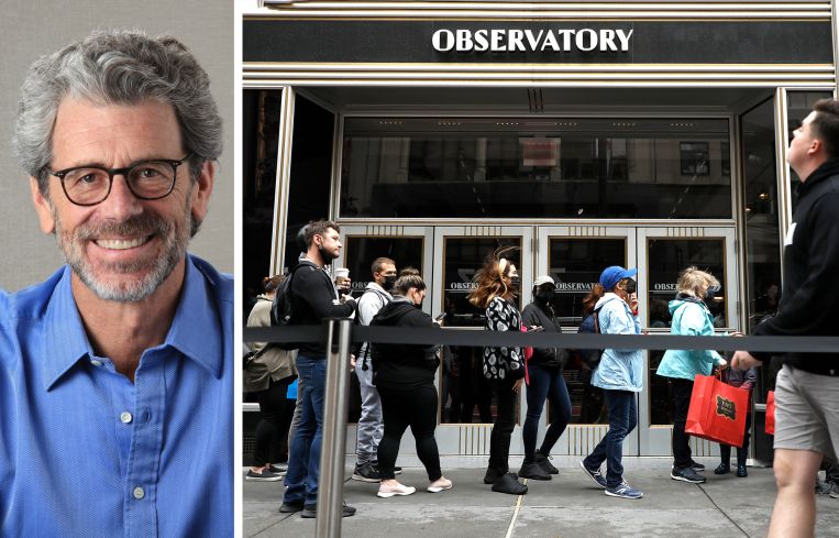 Anthony Malkin, chairman and CEO of Empire State Realty Trust, and visitors to the Empire State Building observatory entrance.