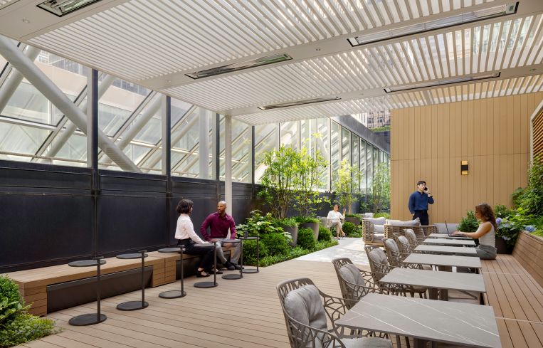 The terrace is carved out of the building’s previously unused roof space.