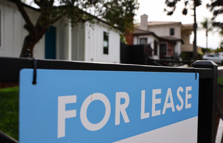 A sign that says for lease.