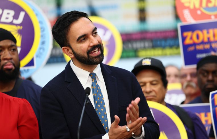 Zohran Mamdani speaking to a crowd.
