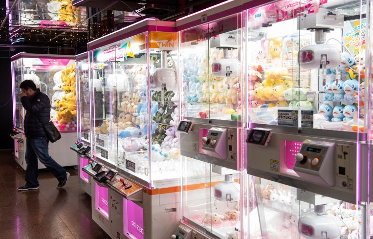 Claw crane machines with stuffed animal toys seen in Tokyo, Japan.