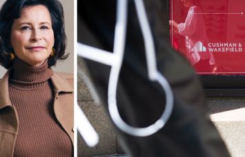 Cushman & Wakefield CEO Michelle MacKay and a Cushman & Wakefield sign advertising space for lease.