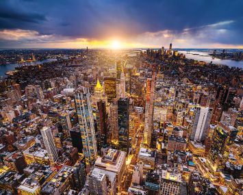 An aerial shot of Manhattan where the buildings appear to glow.