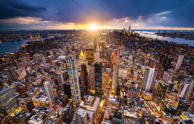 An aerial shot of Manhattan where the buildings appear to glow.