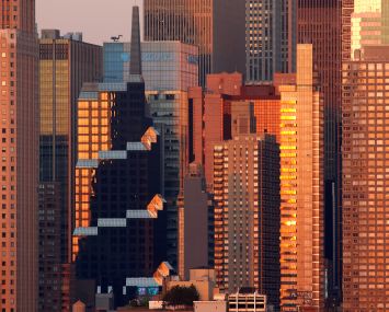 Office towers in midtown Manhattan during sunset.
