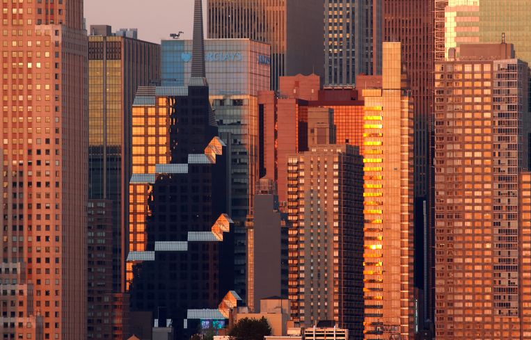 Office towers in midtown Manhattan during sunset.