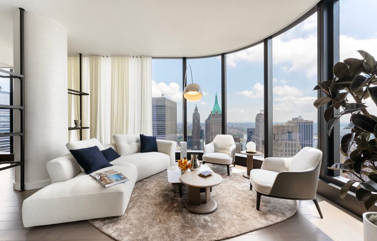 Homes feature marble countertops, radiant-heated marble floors in primary bathrooms, and custom oak millwork.