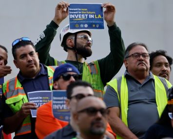 Union members attend a press conference from L.A. Mayor Karen Bass and L.A. City Councilmembers ahead of the Council's Friday vote on the city's convention center expansion initiative.