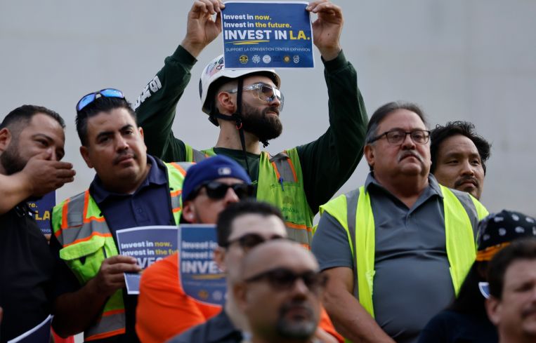 Union members attend a press conference from L.A. Mayor Karen Bass and L.A. City Councilmembers ahead of the Council's Friday vote on the city's convention center expansion initiative.