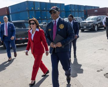 Mayor Eric Adams and Gov. Kathy Hochul walk through the Brooklyn Marine Terminal in May 2024.