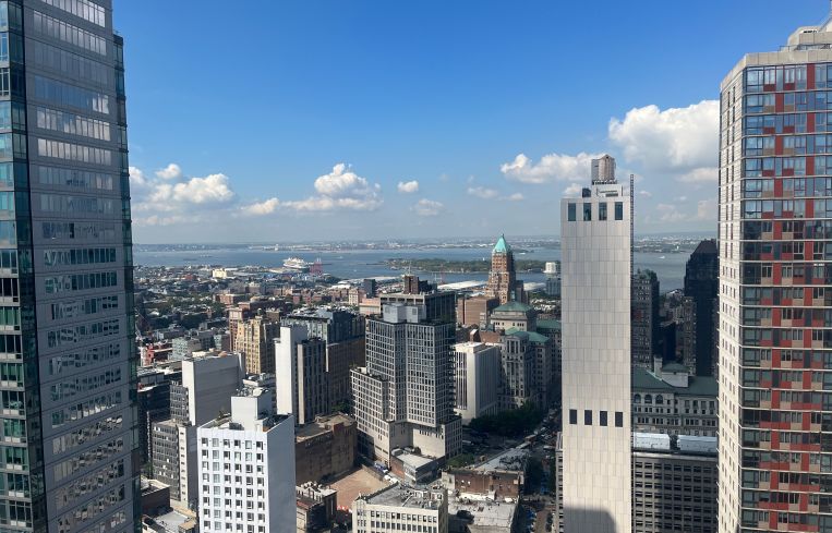The rooftop lounge spans about 4,000 square feet and offers stunning city views.
